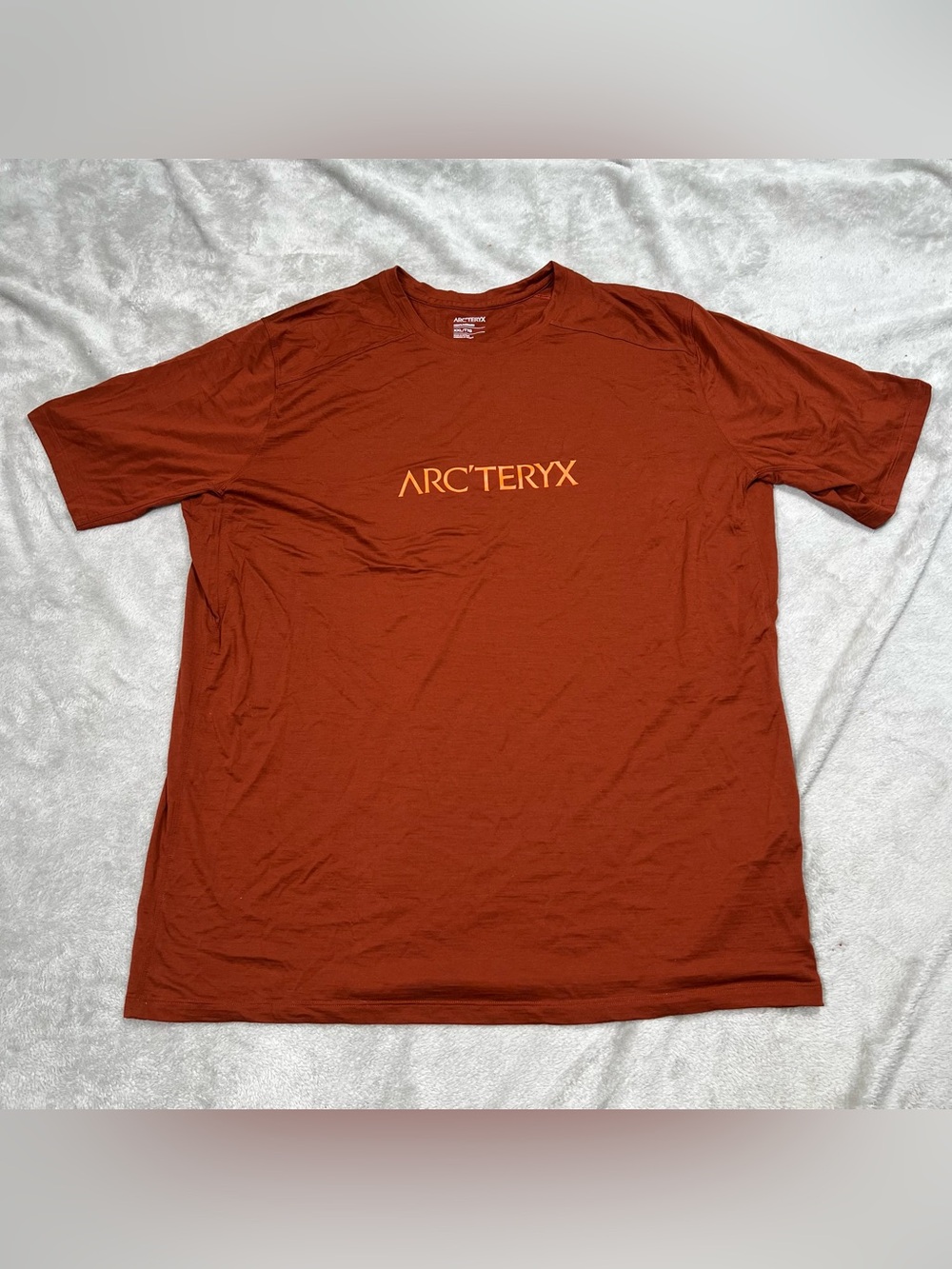 Arcteryx Ionia Merino Wool Arc'Word Logo S/S Shirt Mens 2XL Orange Spellout Tee